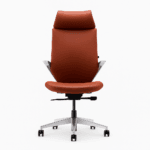 Front view of a sleek tan ergonomic office chair with headrest and chrome base on white background – modern executive seating